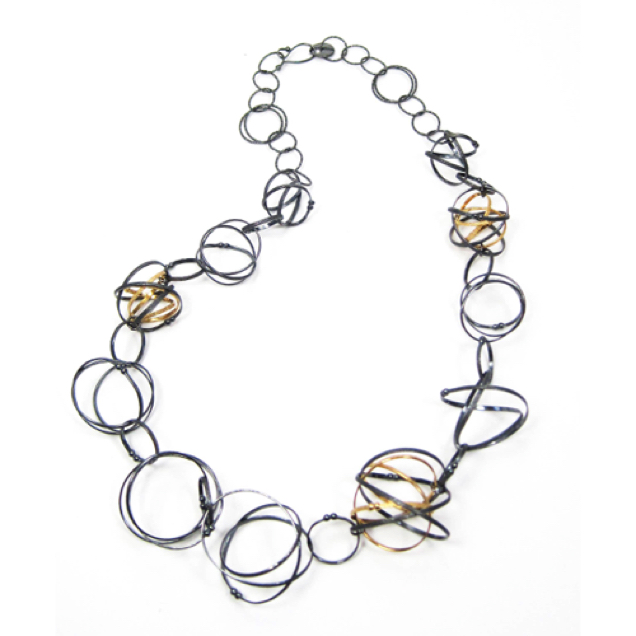 Grand Mobius Necklace  22"
 
Oxidized Silver & 22K Gold vermeil
NKMB04-G-OX   675.